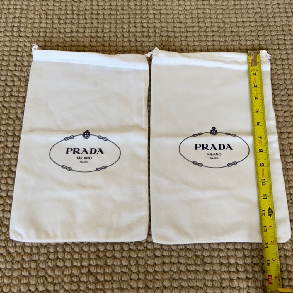Pair of Prada shoe covers. Each 8.5” x 14”.